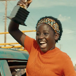 queen-of-katwe-phiona-celebrating